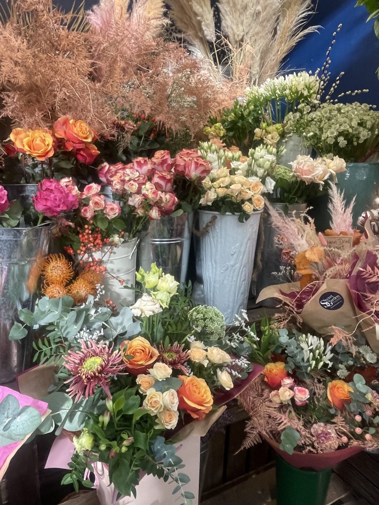 Bouquets in a row at a flower shop.