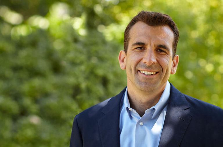 Liccardo smiling at the camera