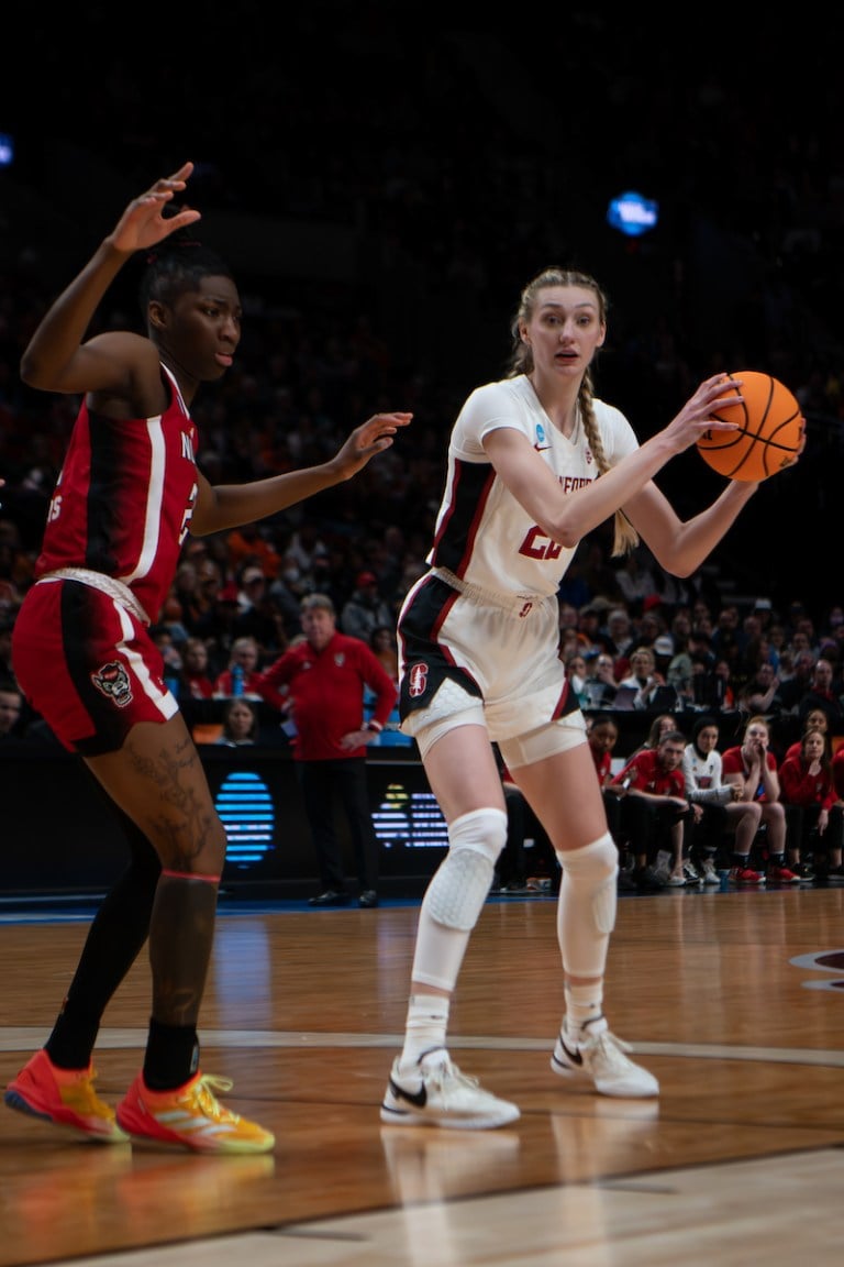 Cameron Brink looks to pass in a game against NC State.