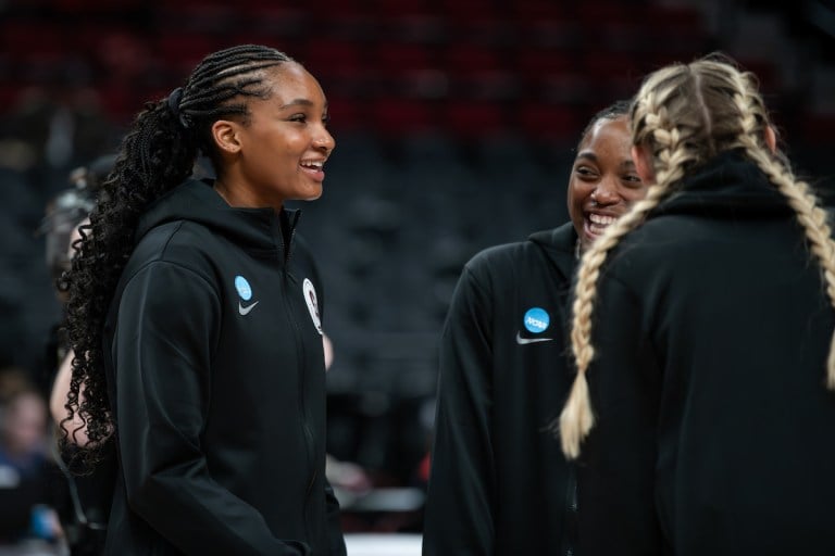 Kiki Iriafen laughs before a NCAA tournament game against NC State.