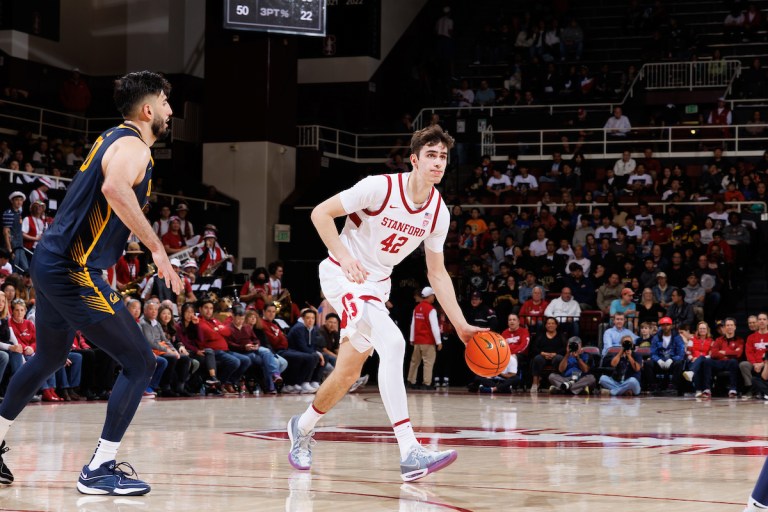 Maxime Raynaud dribbles a basketball against Cal.