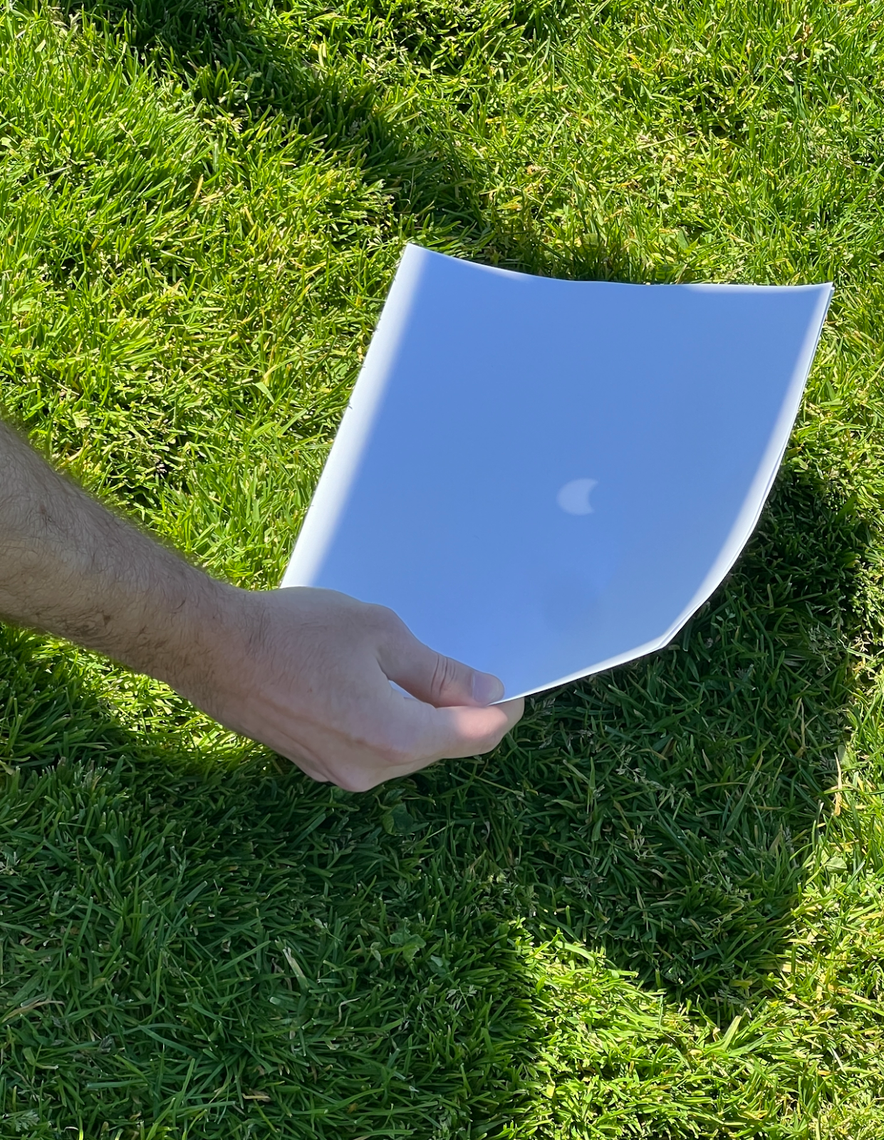 The shadow of the eclipse as seen through a pinhole viewing device.