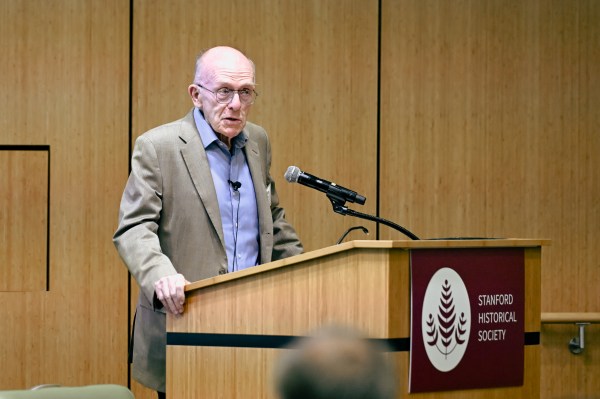 A man stands at a podium.