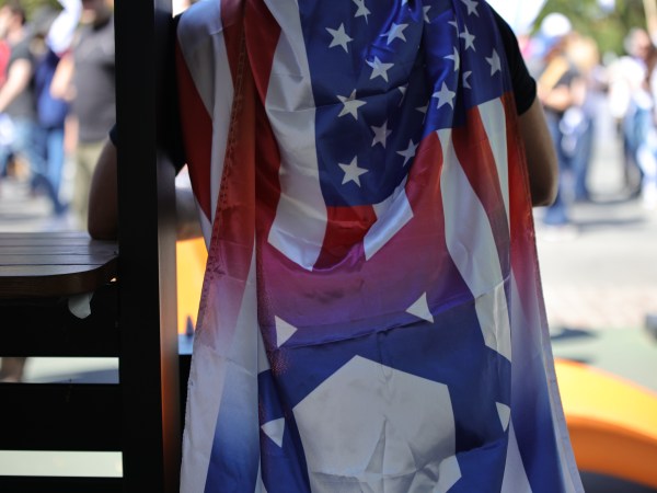 A flag that blends together the American and Israeli flags.