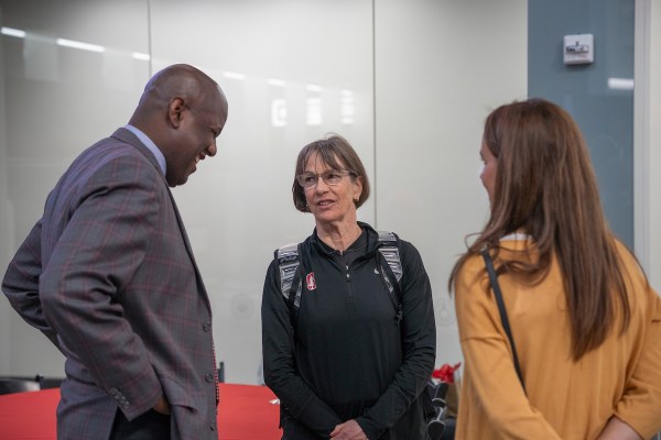 Bernard Muir and Tara VanDerveer talk at Kate Paye's press conference.