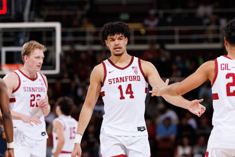 Spencer Jones greets his teammates during a game against UC Berkeley.