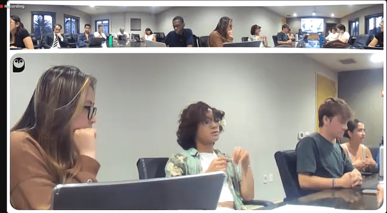 Zoom screenshot of Undergraduate Senators sitting at a table.