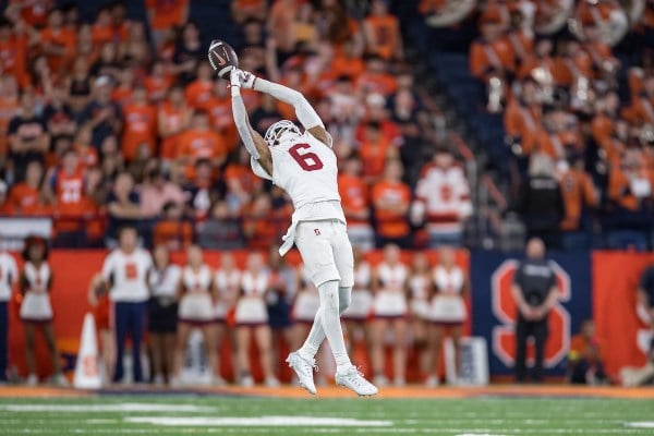 Collin Wright deflects a pass against Syracuse