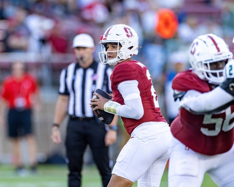 Elijah Brown looks to throw a pass against Cal Poly