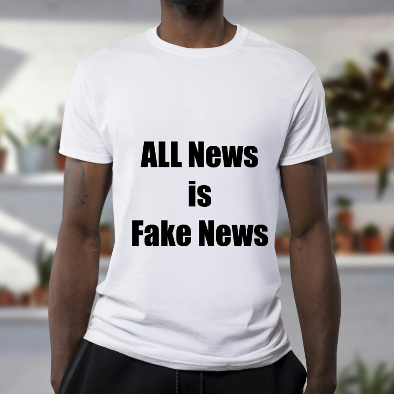 A shirt with the writing "All news is fake news."