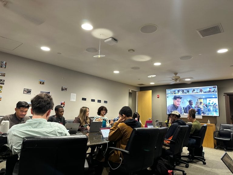 The Undergraduate Senate discusses funding approval at a meeting.