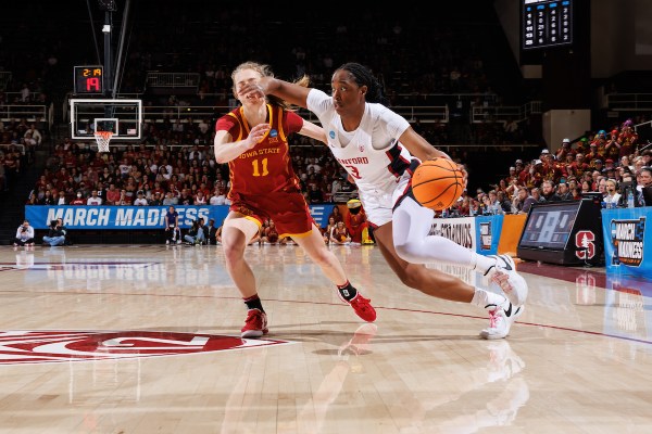 Nunu Agara drives past Emily Ryan during last year's Round of 32 game.