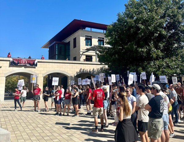 A group of graduate workers gathering in front of Engineering Quad