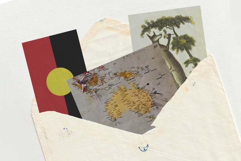 A paper envelope with Australia-themed postcards