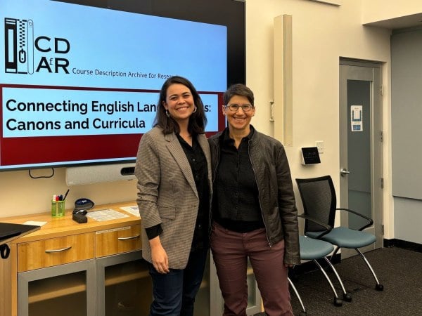 Nichole Nomura (left) and Sarah Levine (right) pose before their talk,