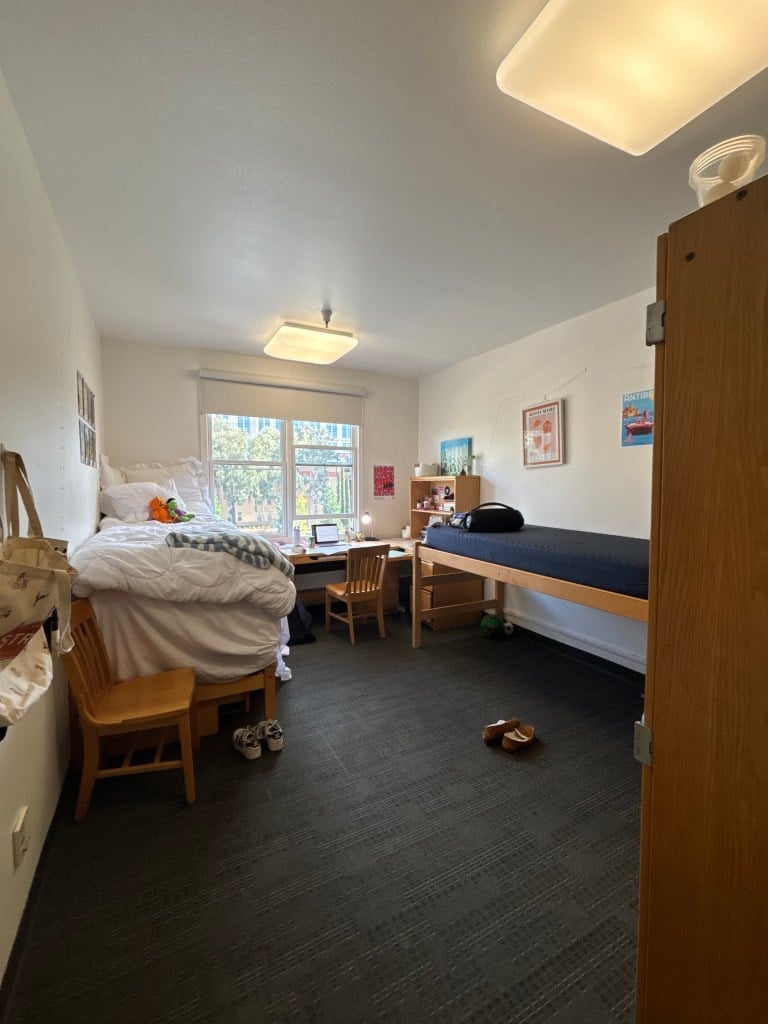 A photo of a one-room double dorm room.