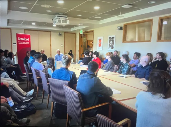 Former U.S. ambassadors Michael McFaul ’85 M.A. ’86 and Steven Pifer ’76 speak at a Democracy Day event.