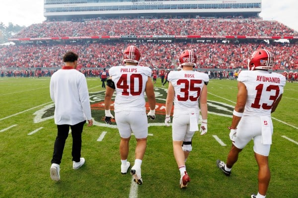 Football players walking on the field