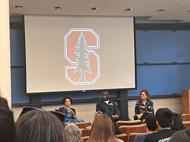 Panelists speak at a Democracy Day event about the intersection of public health, politics and policy. (SHREYA KOMAR/The Stanford Daily)